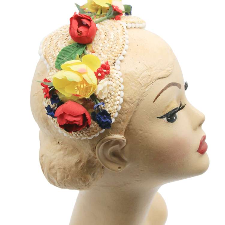 Half hat made of straw Flowers yellow, red, blue